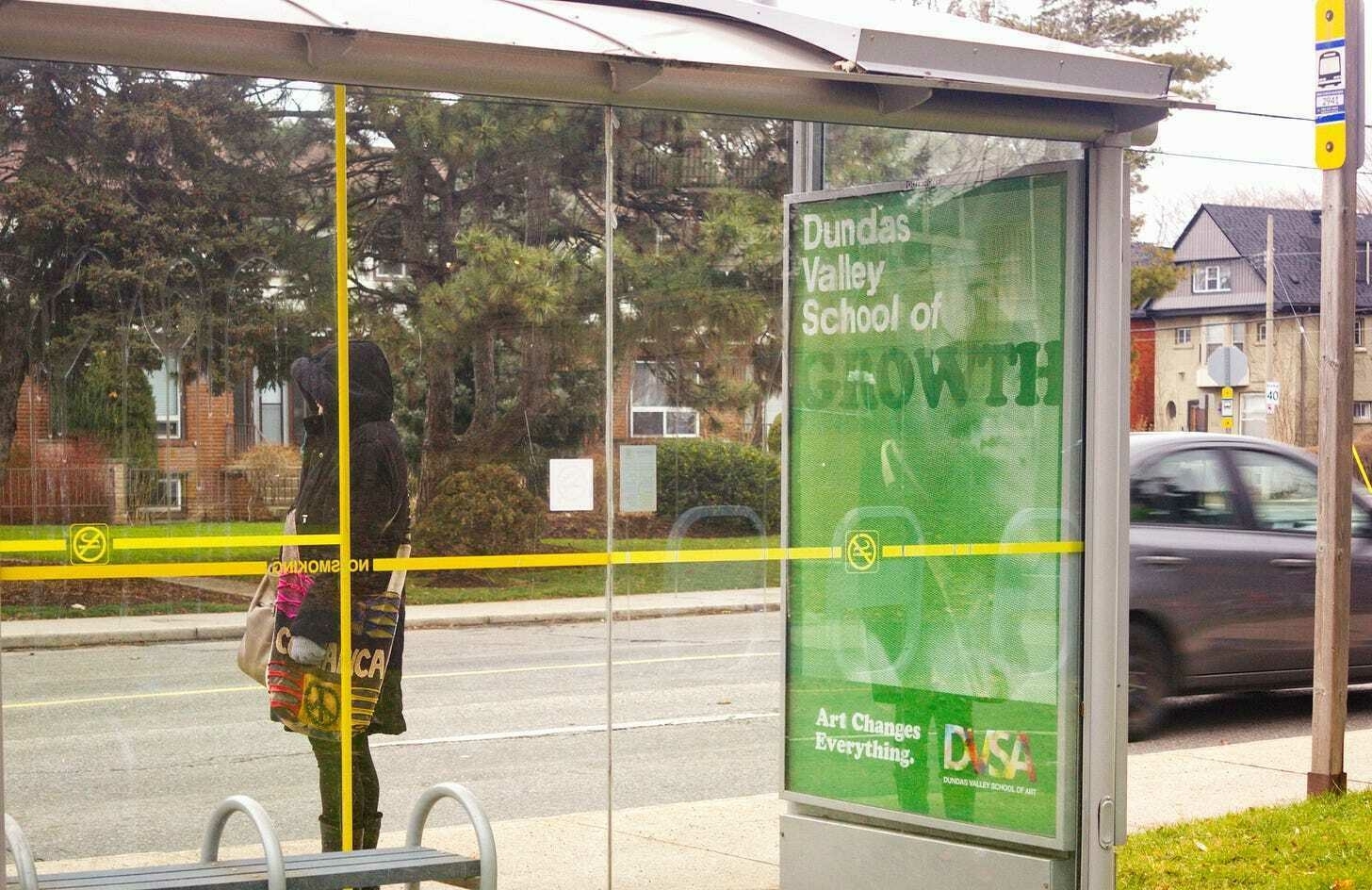 Another DVSA ad: "Dundas Valley School of Growth" shows a man smiling