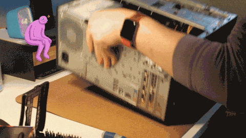 A video of me working on my computer with the previously mentioned random little dude with a flower on their head placed into the background of the shot.